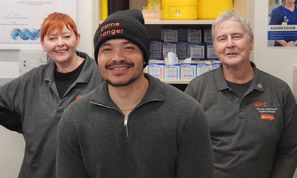 3 staff members in branded attire